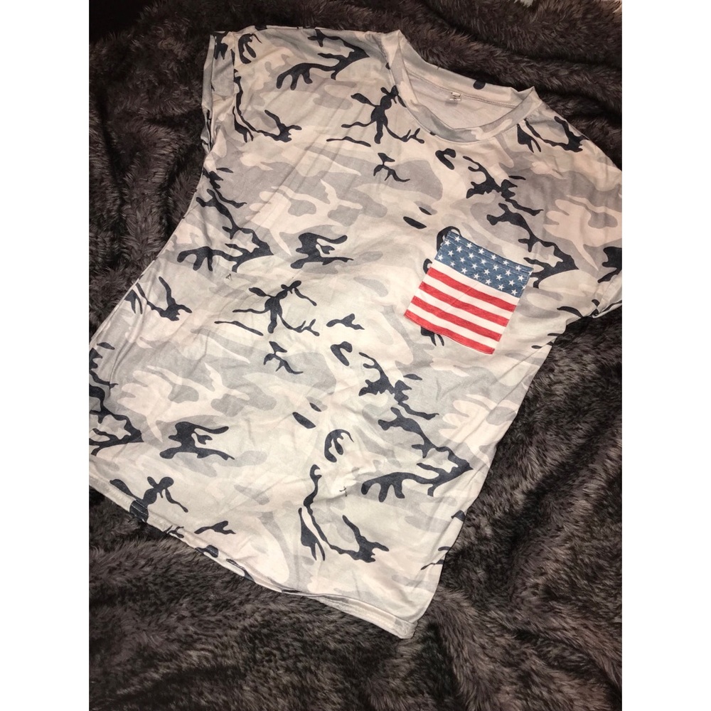 Camouflage tee with American flag pocket. NWOT.
